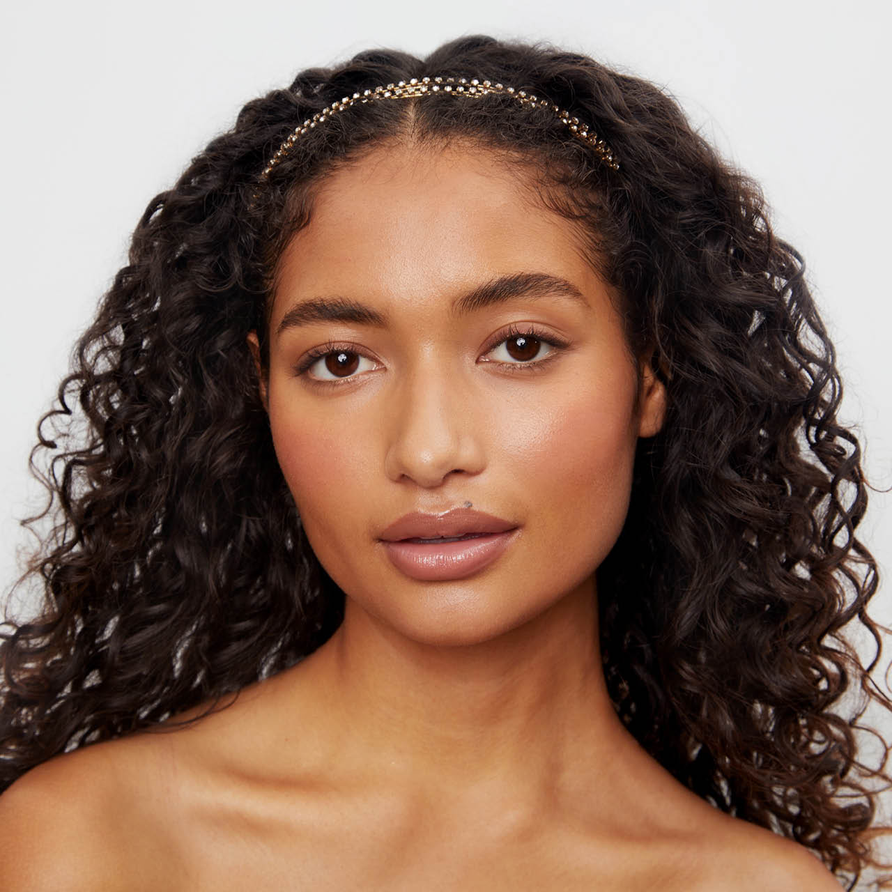 Fascia doppia in metallo dorato con strass