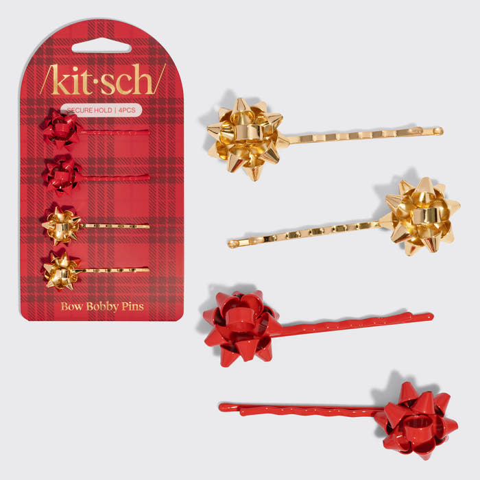 KITSCH Red & Gold Metal Gift Bow Bobby Pins 4pc Set — two gold and two red gift bow bobby pins beside the Kitsch packaging card — Keeps hair securely in place with a comfortable hold — festive holiday hairstyles