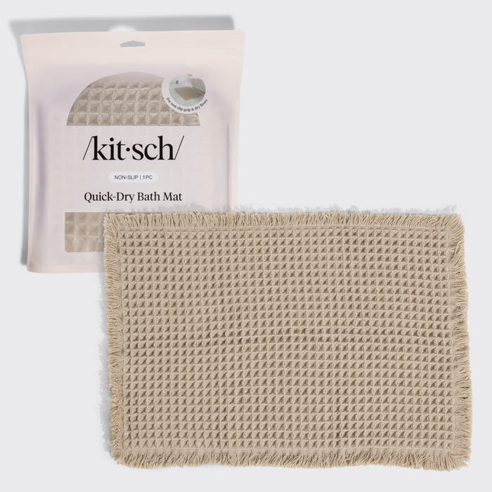 KITSCH Camel Quick-Dry Bath Mat — hero shot of the folded waffle-knit mat with its retail packaging — Plush waffle texture creates a soft, cushioned feel underfoot — an everyday luxury for your bathroom floor