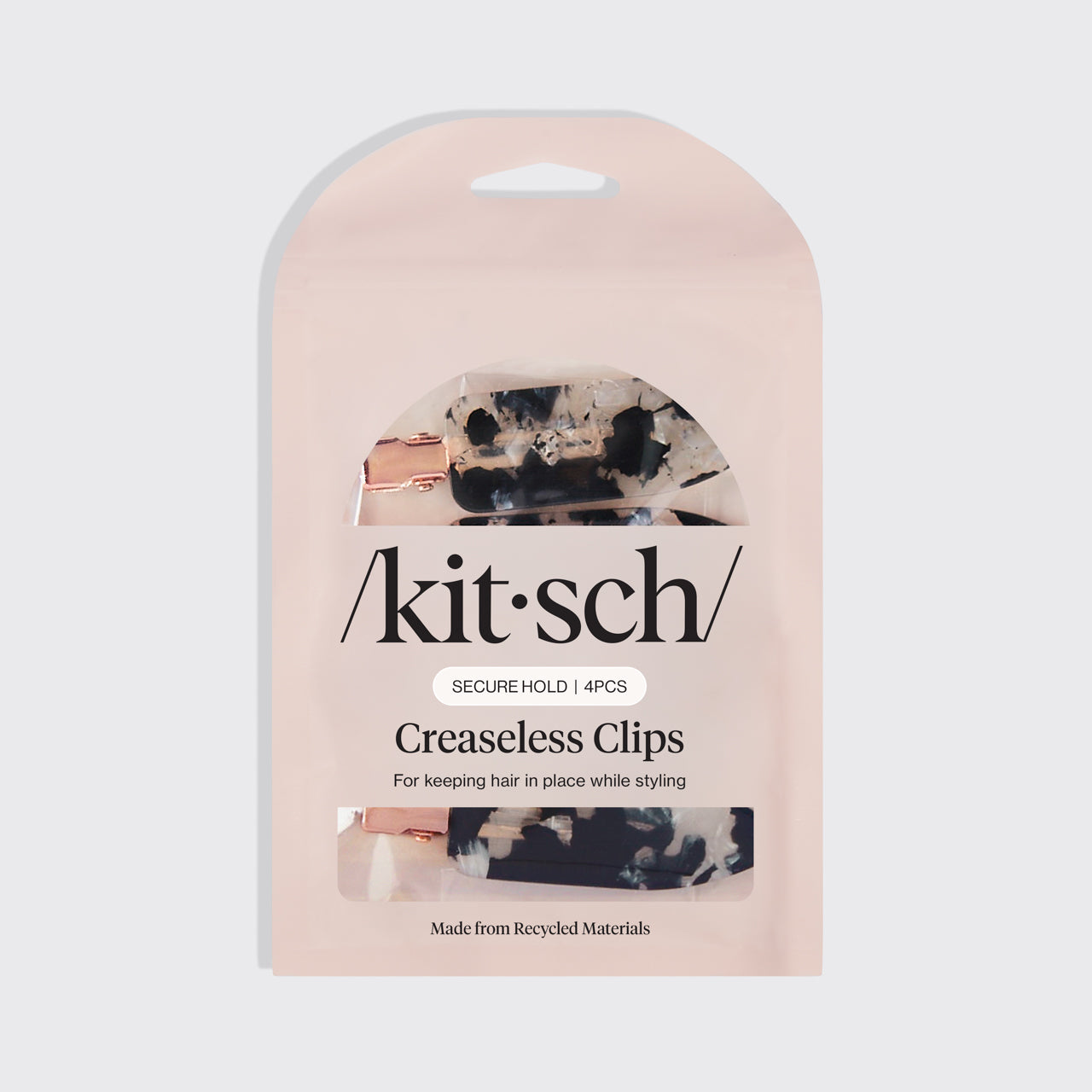 Kitsch Creaseless Hair Clips 4pc Set displayed in retail packaging on a gray background.
