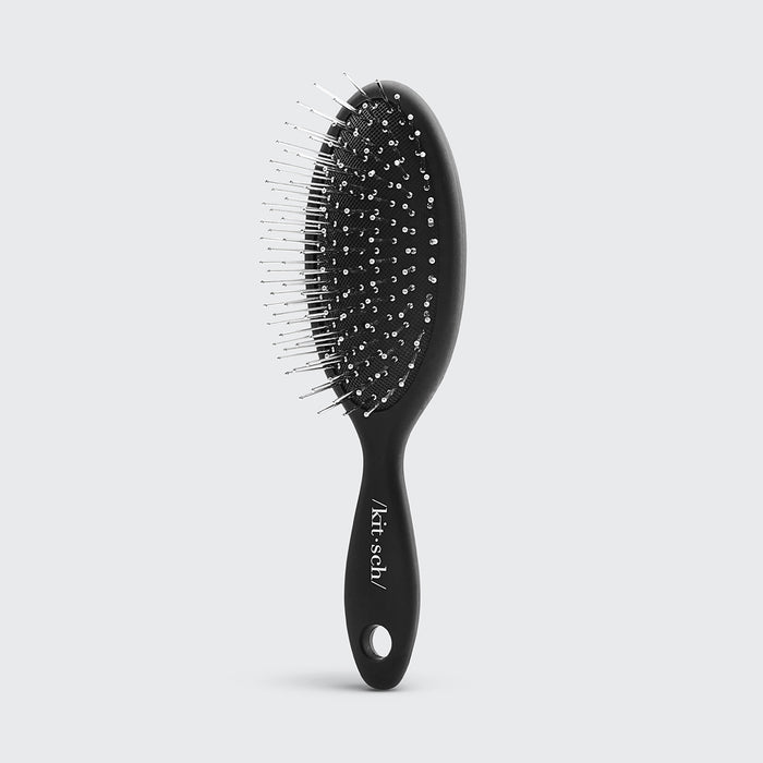 Mini brosse à cheveux de voyage en poils métalliques consciemment créée