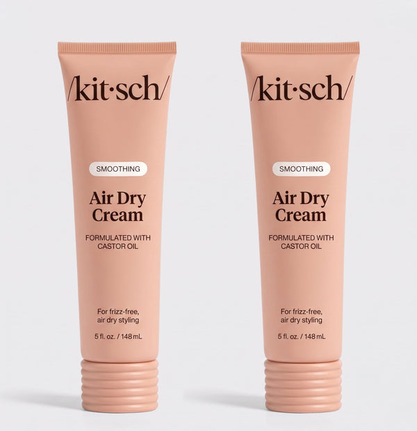 Two tubes of Kitsch Smoothing Air Dry Cream formulated with castor oil, 5 fl. oz. (148 mL), displayed side by side on a white background for frizz-free, air-dry styling.